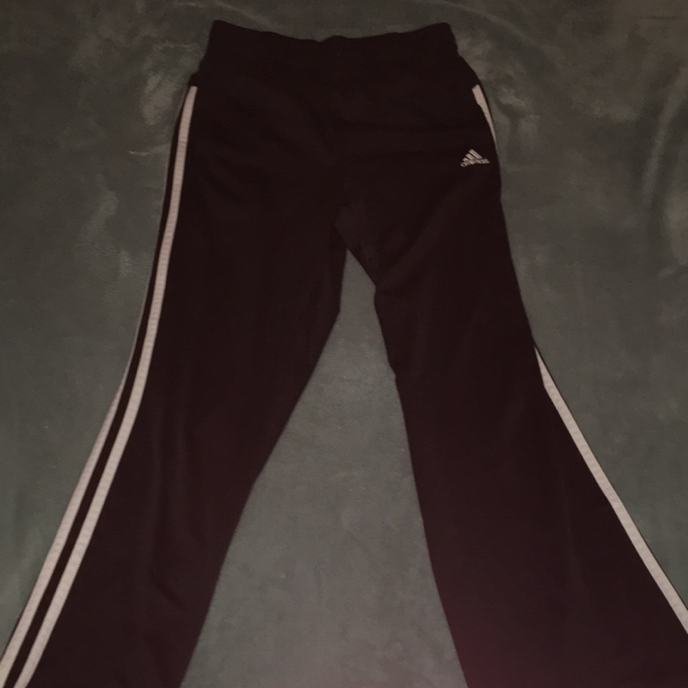 A pair of Adidas joggers